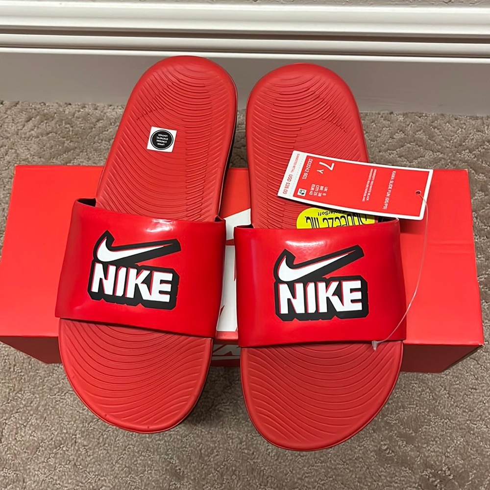 Brand new youth nike red kawa slide size 7